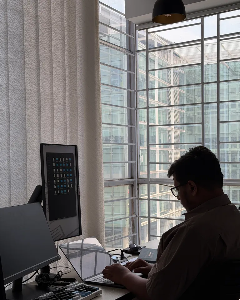 An Automata One engineer building software at the studio